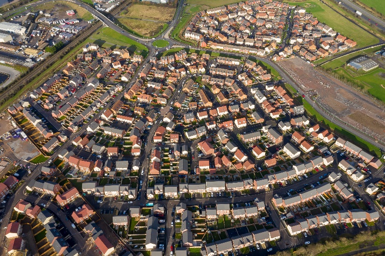 An aerial view of a neighborhood

Description automatically generated