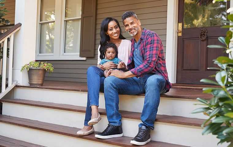 a happy family at a home